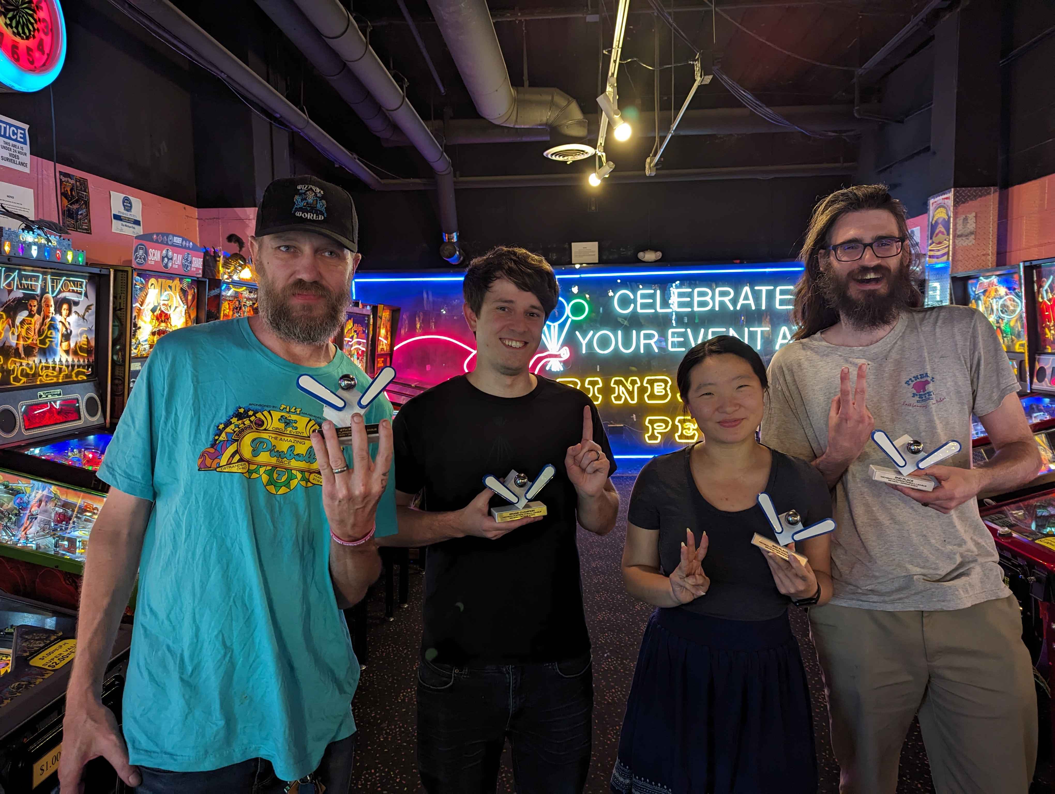 The winners from Michigan Flippers Pinball League Season 1. Left to right: Pat (4th), Austin (1st), Cindy (3rd), Ryan (2nd).